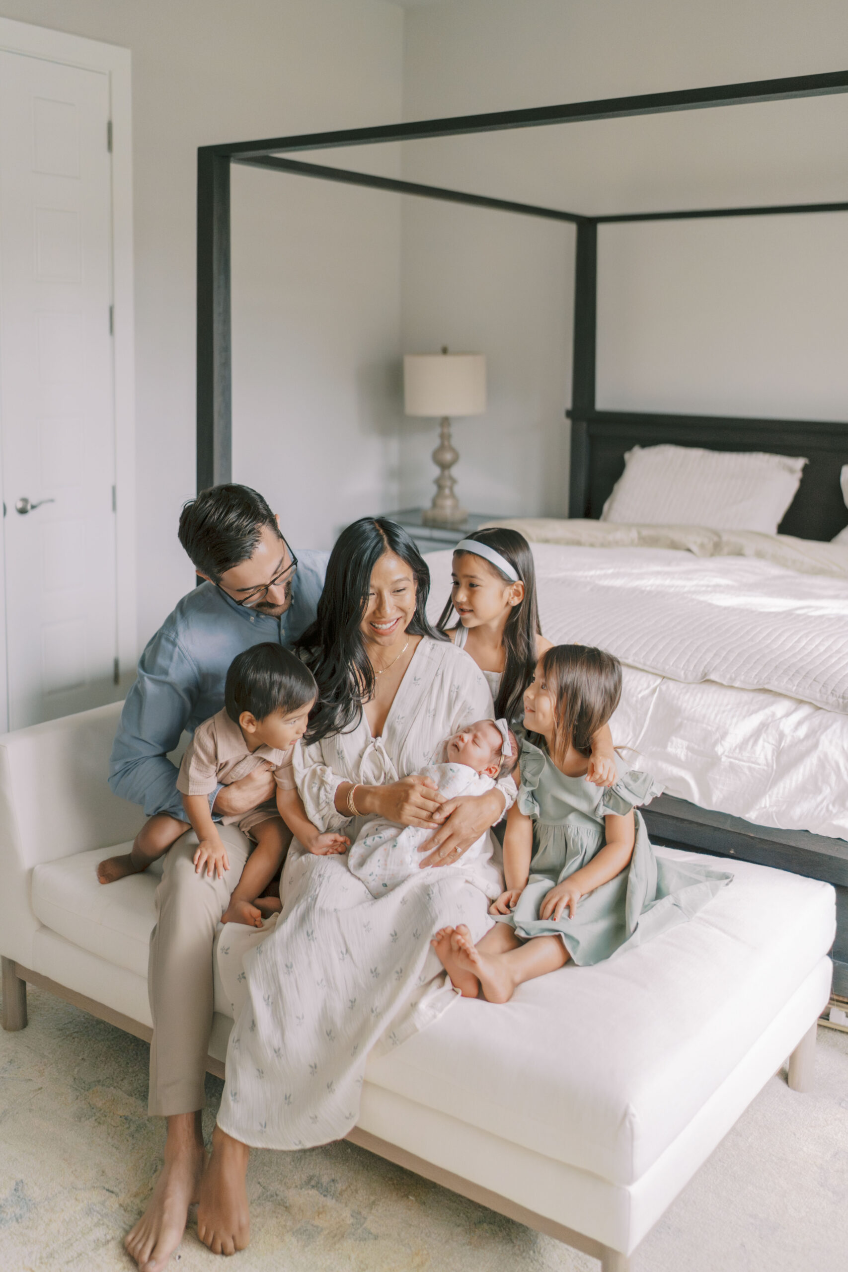 family all looking at newborn colorado springs newborn photographer