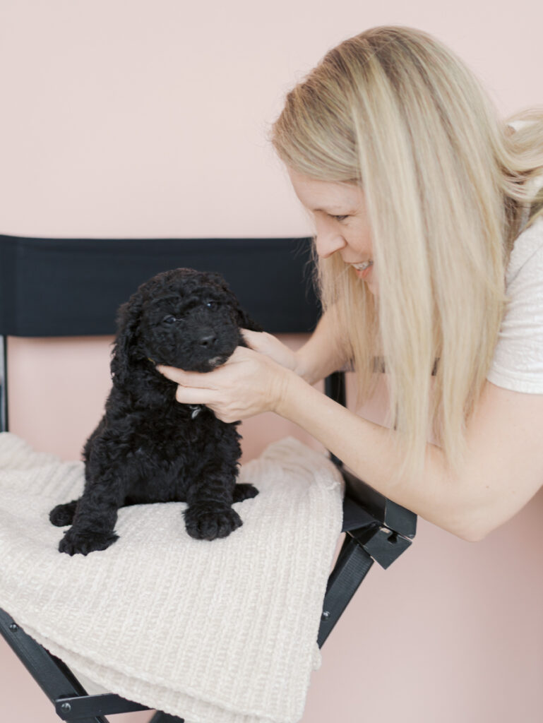 owner of duncan doodles with small puppy