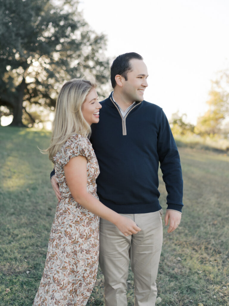 side view of couple smiling at son taken at Colorado Springs Family Photos by Lauren Bounds Photography