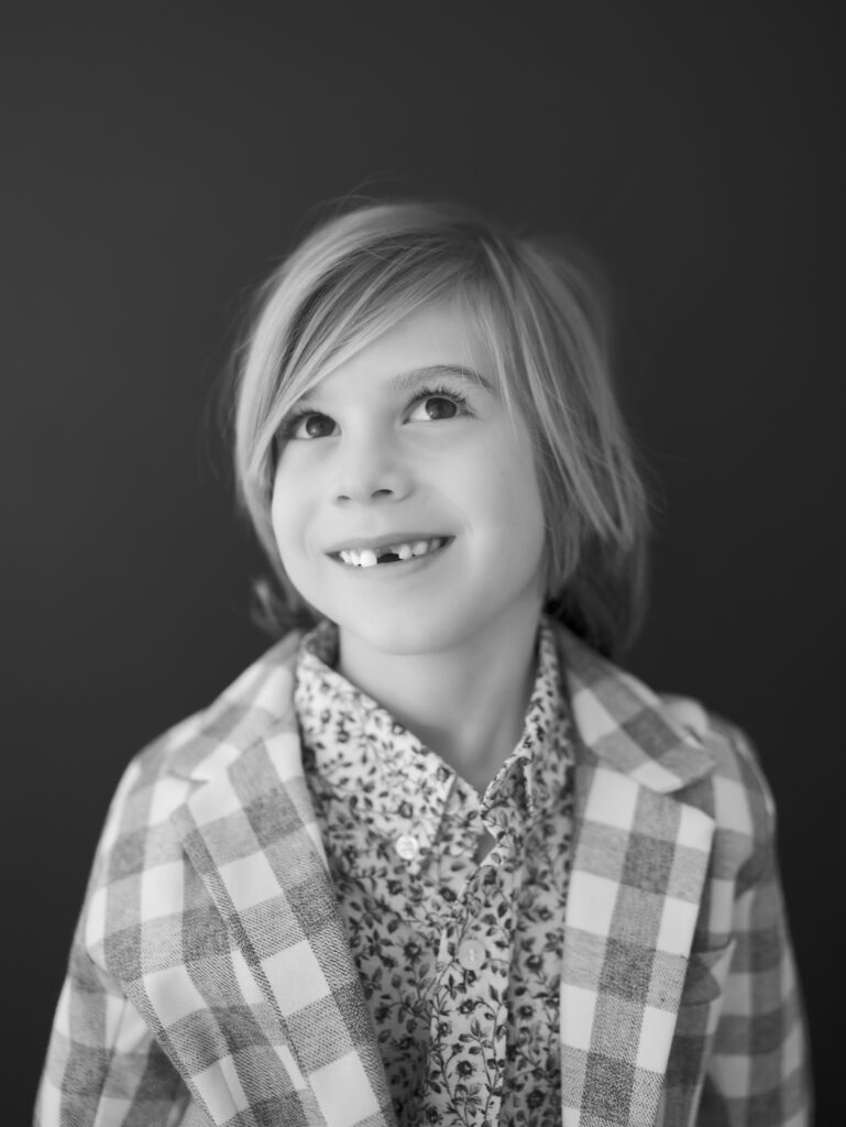 boy smiling off to the side Kid headshots, Lauren Bounds Photography in Colorado Springs, CO