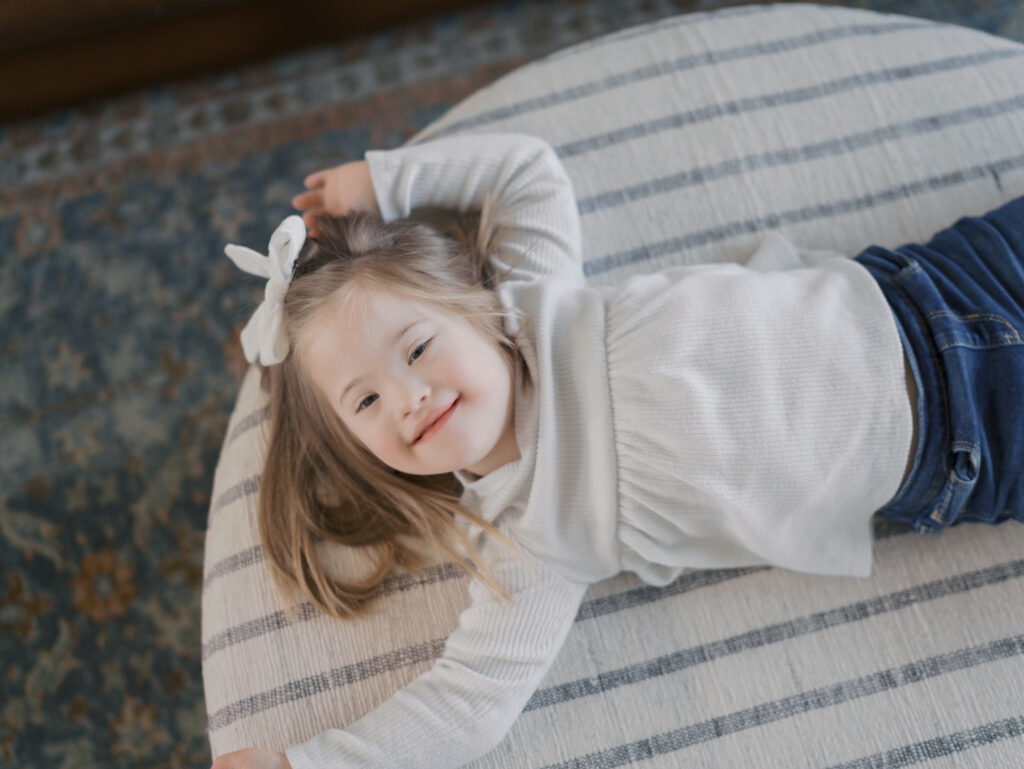 girl smiling on couch