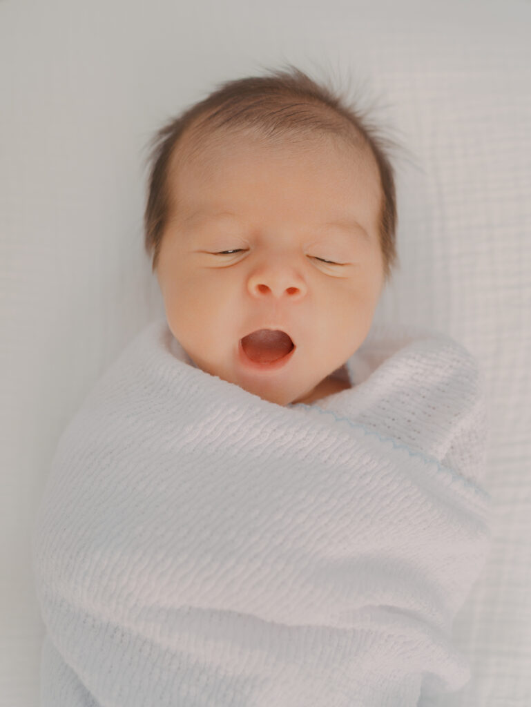 baby yawning taken by Colorado Springs Maternity Photographer