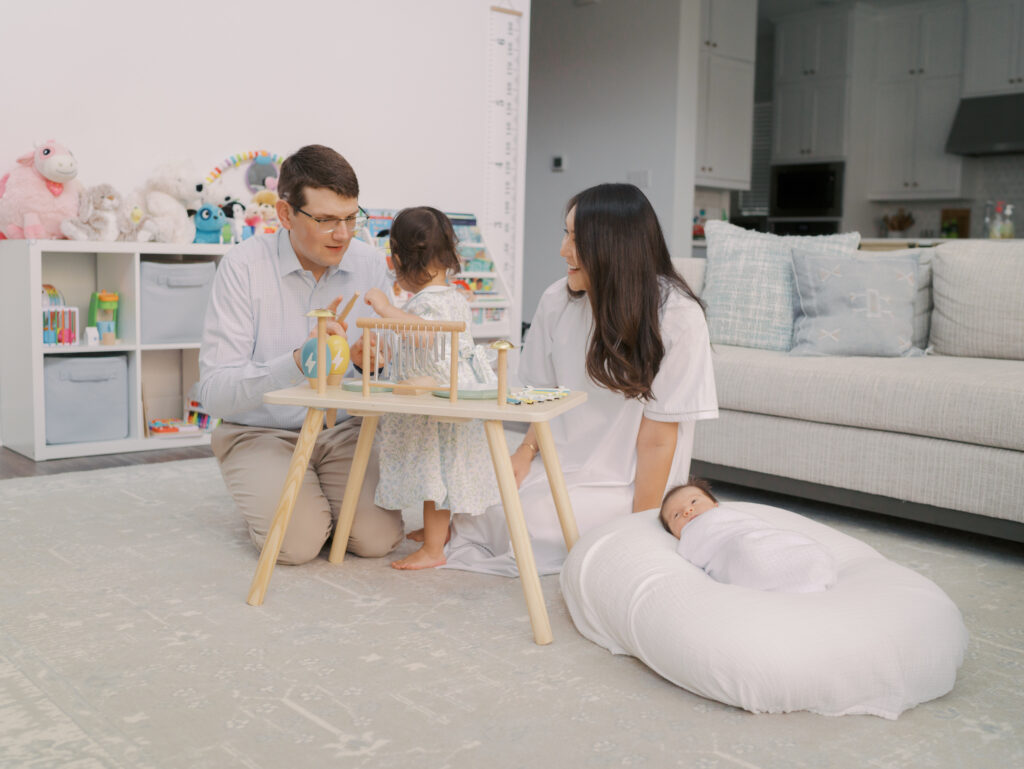 Family playing in living room
