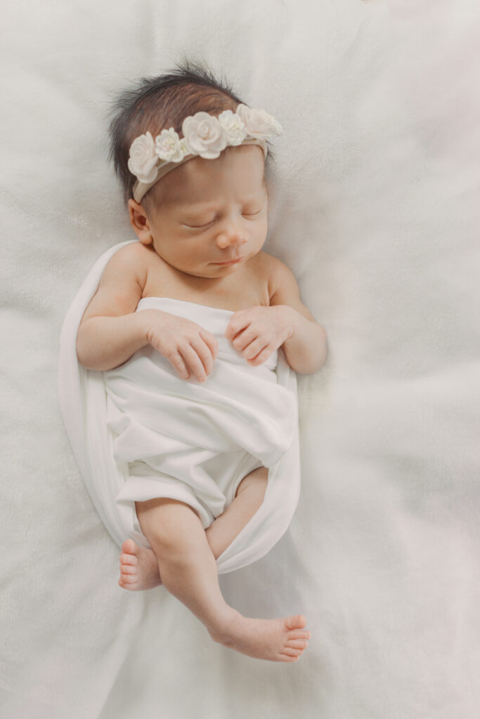 Angelic photo of newborn swaddled in white | Colorado Springs Newborn Photography | Lauren Bounds Photography