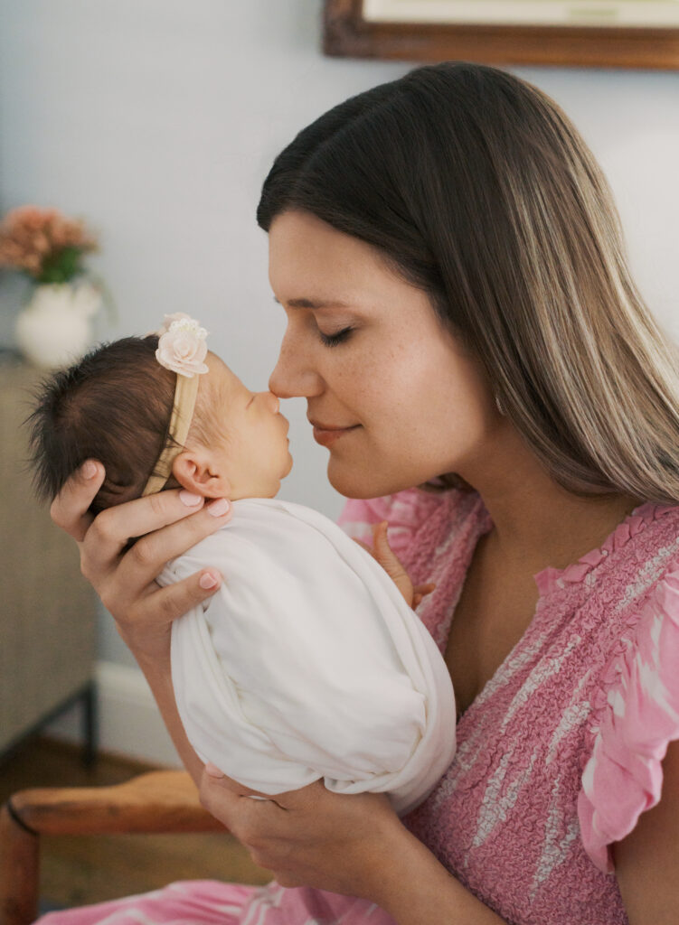 mom nuzzling infant