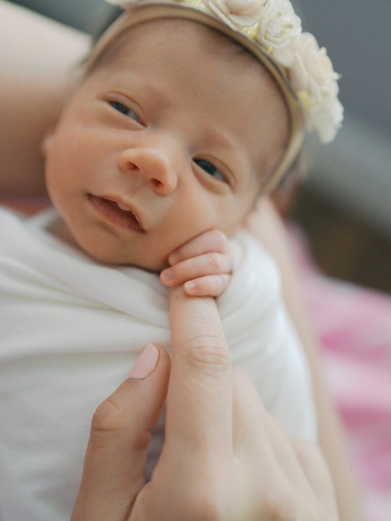 Tiny hand of newborn baby holding mom's finger | Colorado Springs Newborn Photography | Lauren Bounds Photography