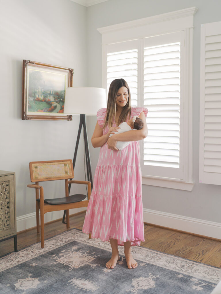 Mom holding newborn baby in home | Colorado Springs Newborn Photography | Lauren Bounds Photography