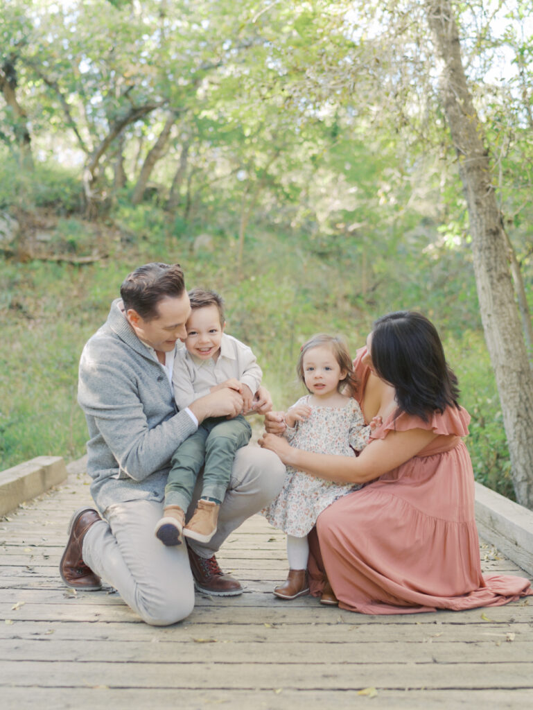 family together at Bear Creek Nature Center during a Colorado Springs Family Photo session