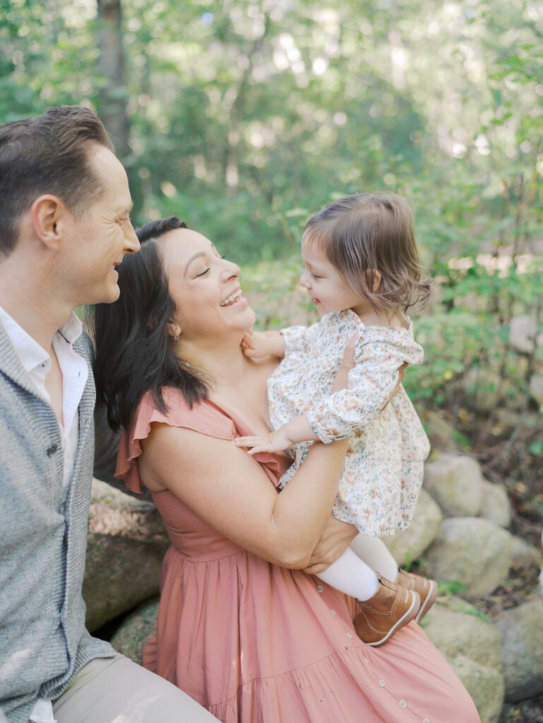 mom lovingly smiling at toddler. Colorado Springs Family Photo session at Bear Creek Nature Center Taken by Lauren Bounds Photography