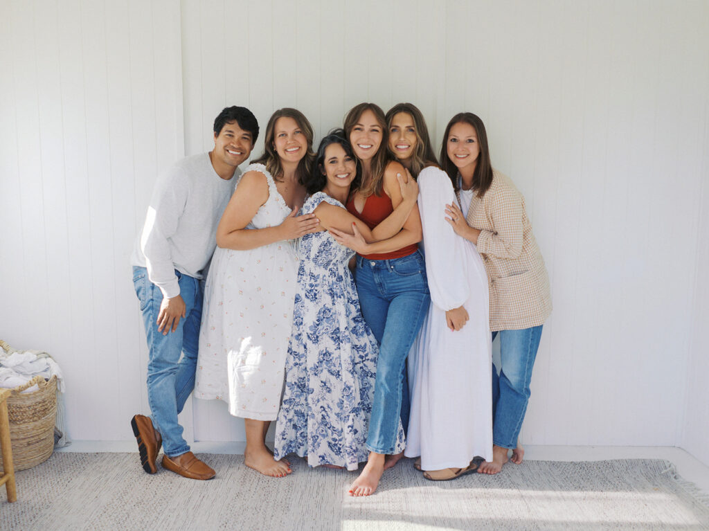 group of colorado springs photographers hugging and smiling