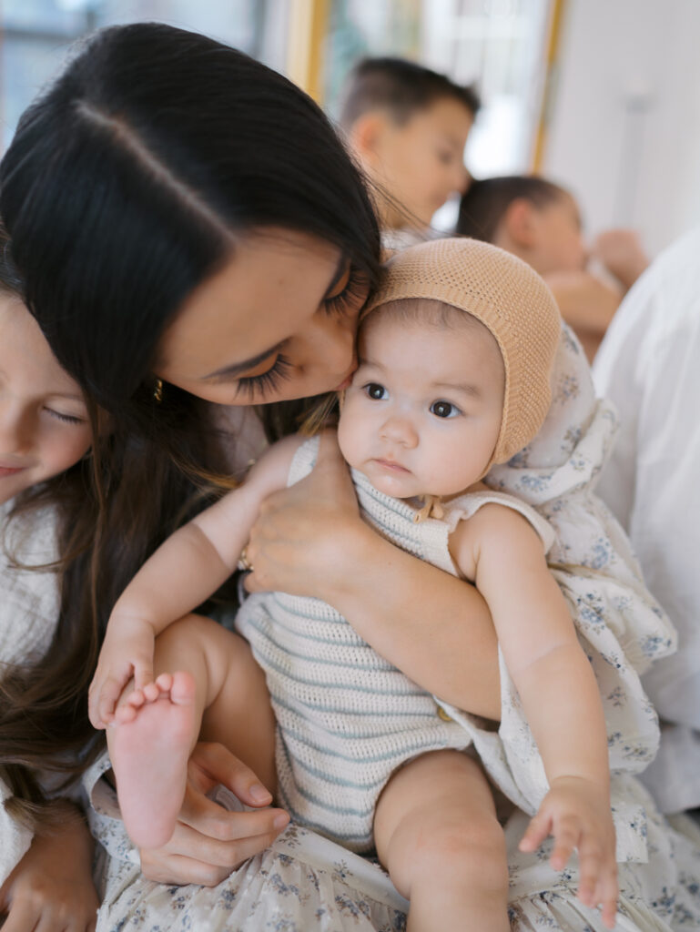 close up of mom kissing baby's head Family Photos Colorado Springs