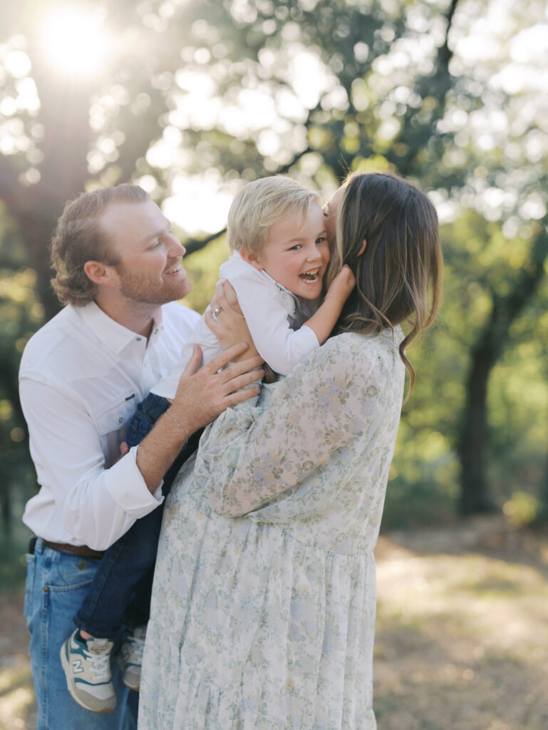 family of three hugging for Colorado Springs Maternity Photography