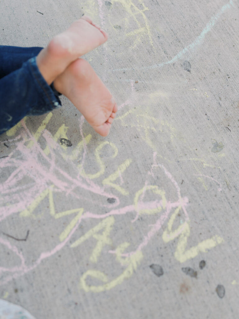 chalk and boys feeting during Colorado Springs Maternity Photography