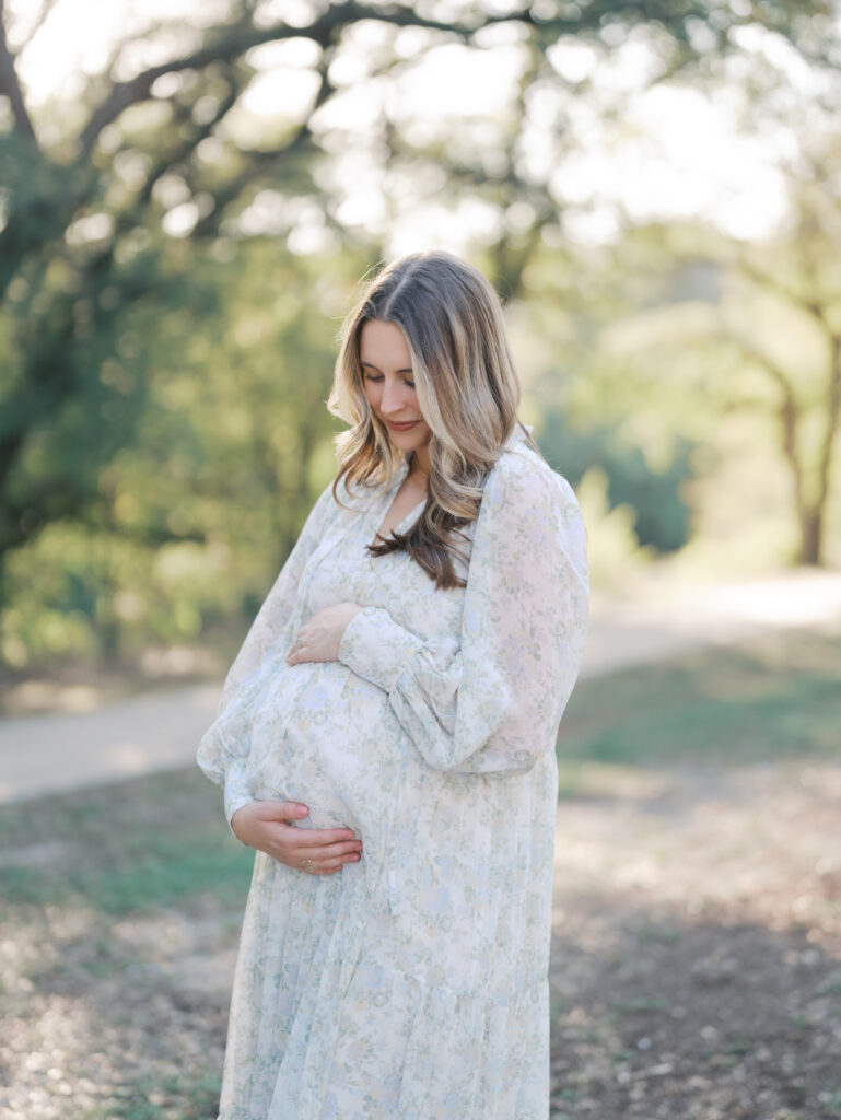 expecting mom holding belly