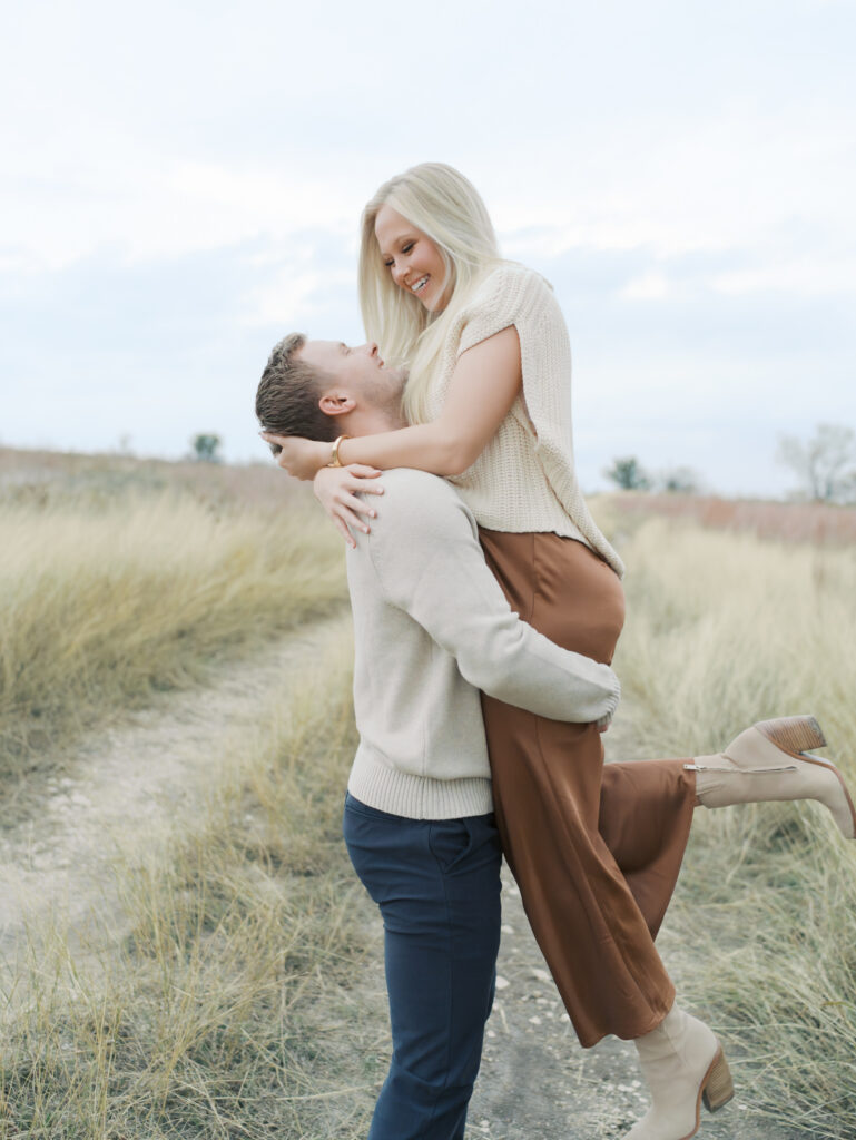 couple embracing in hug by colorado springs newborn photographer
