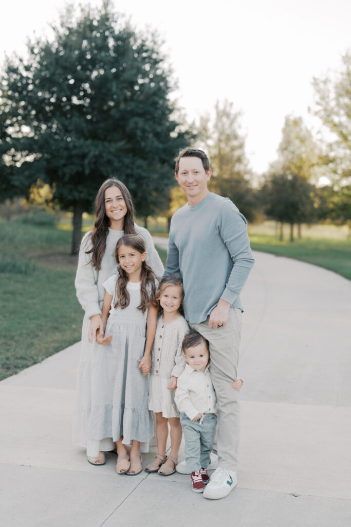 family of five standing together for Colorado Springs family photographers