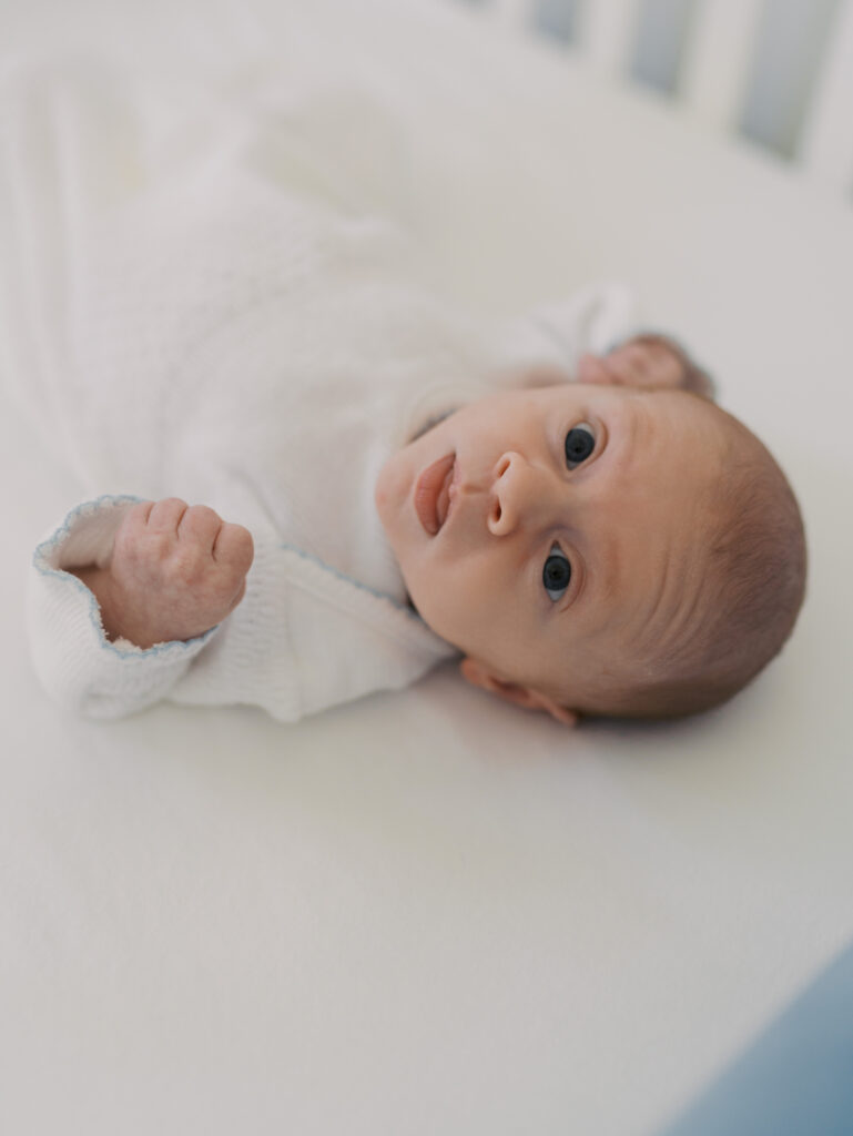 baby laying in crib