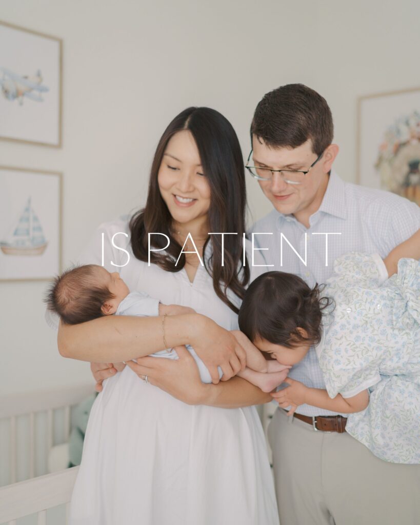 family of four in nursery , toddler is kissing newborns feet while in dads arms and baby in moms arms 