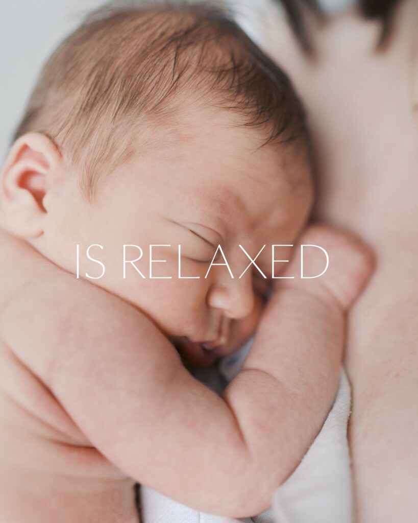 close up of baby head and arm laying on moms chest telling the Newborn Photography Experience Colorado Springs