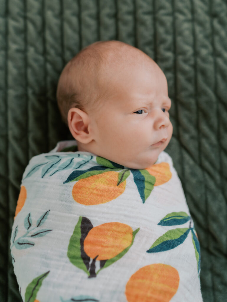 newborn baby swaddled