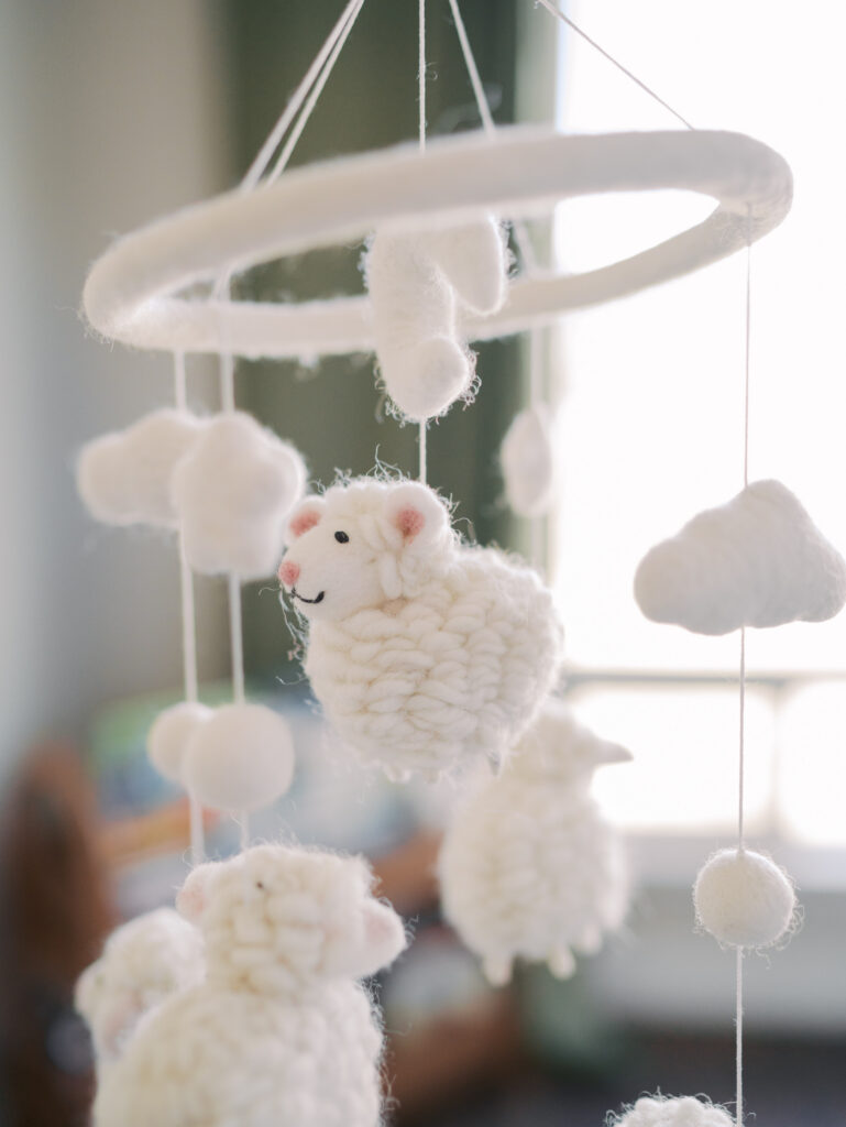 lamb mobile in baby's nursery